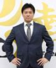 　佐藤輝の成長を喜ぶ林威助氏