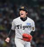 ４回、エンカーナシオンを三振に仕留め、ほえる才木（撮影・西田忠信）