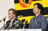 　会見する粟井球団社長（左）と藤川監督（撮影・田中太一）